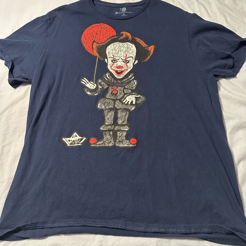 Men’s pennywise dark blue shirt.